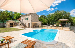 Stunning home in Runovic with WiFi, Outdoor swimming pool and 2 Bedrooms